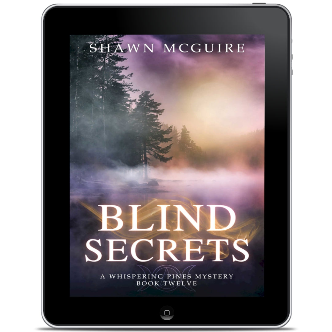 E-book cover on e-reader of Shawn McGuire's cozy murder mystery series set in Whispering Pines, featuring a lake shrouded in fog.
