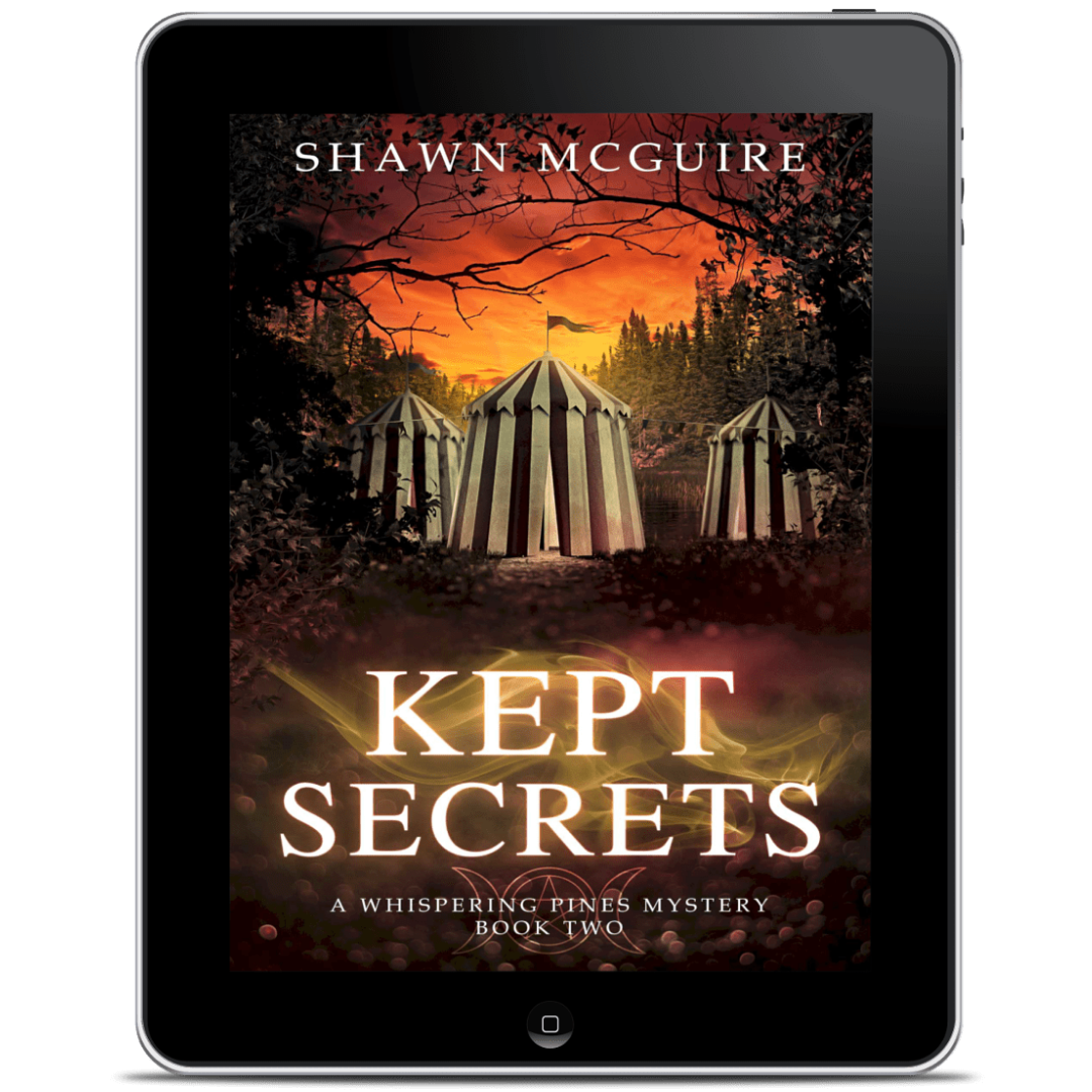 Tablet displaying the book cover of 'Kept Secrets' by Shawn McGuire