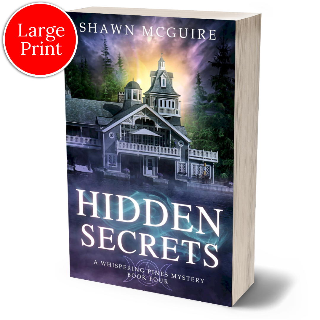 Large print paperback cover of Shawn McGuire's cozy murder mystery featuring a beautiful house on a lake.