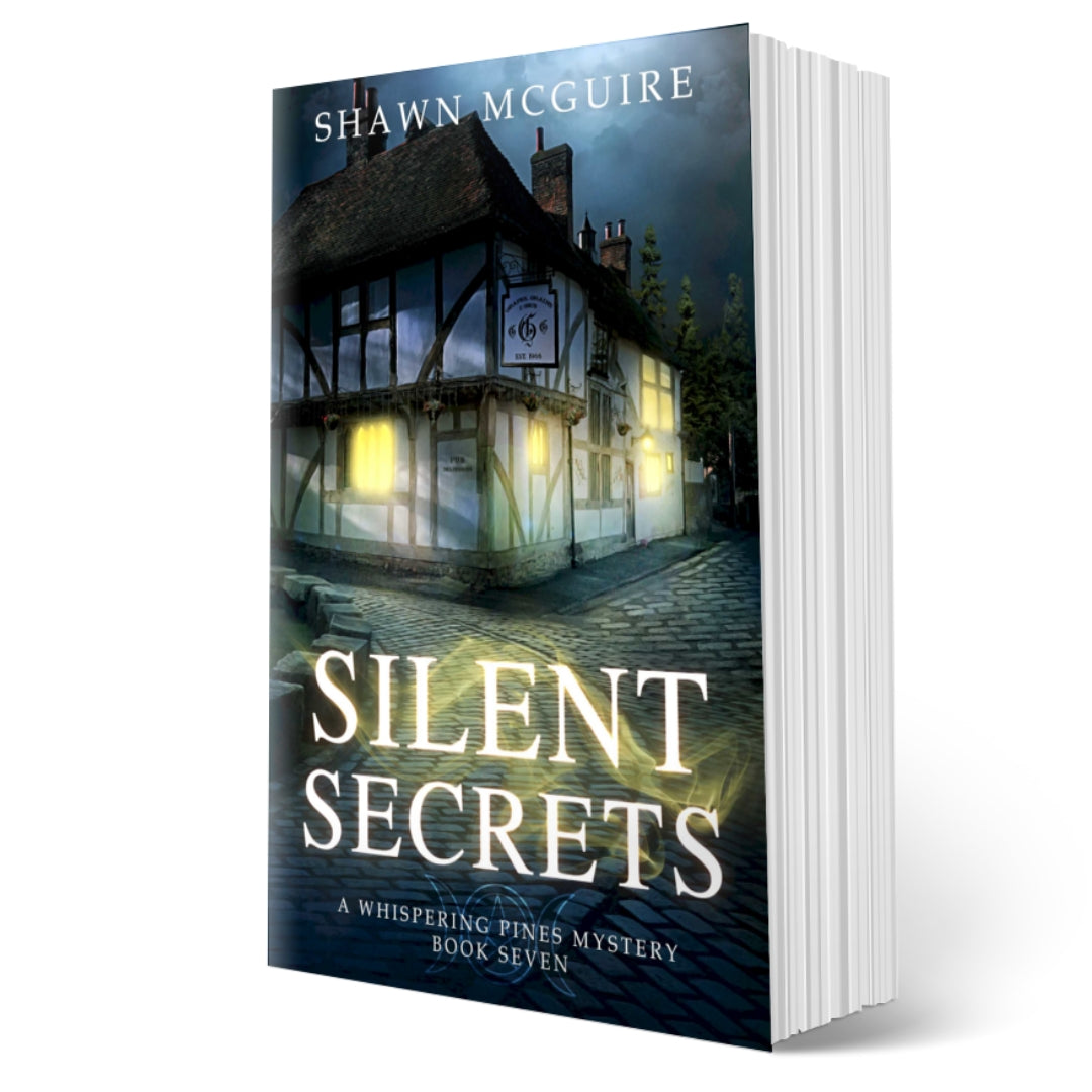 Cover of Shawn McGuire's cozy murder mystery featuring a pub on a cobbled pathway.