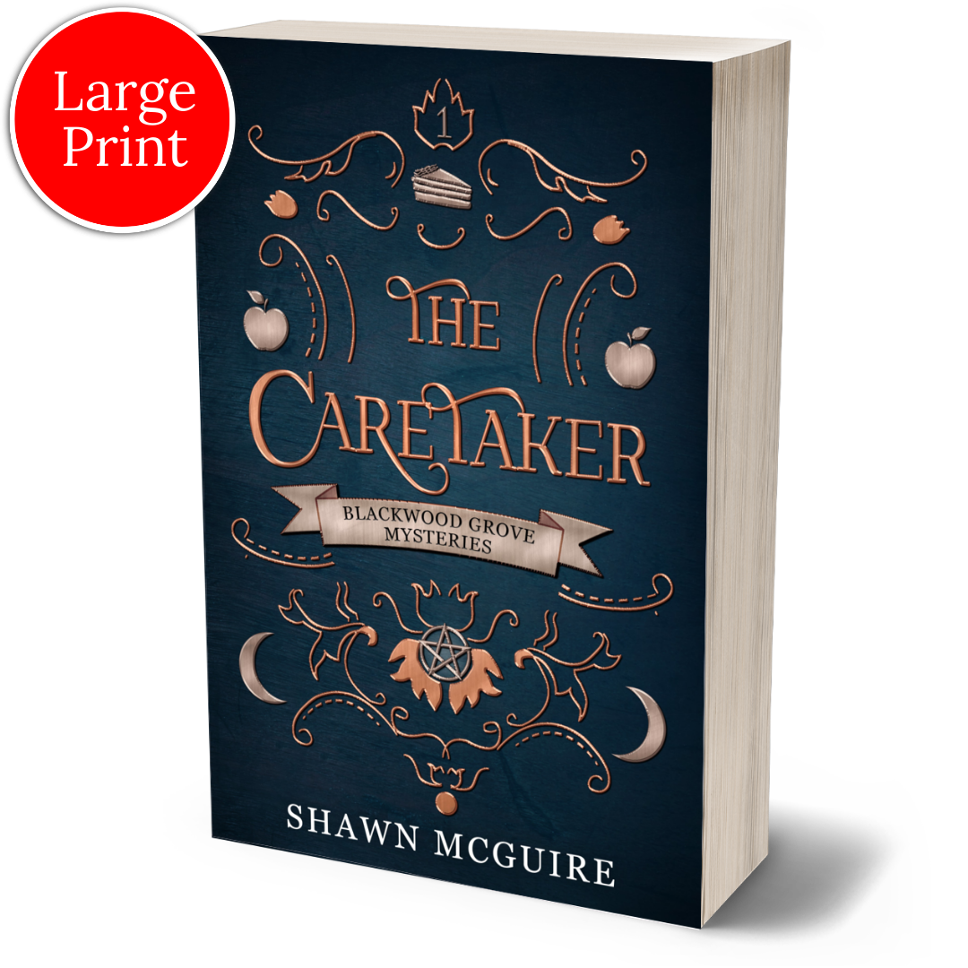 Cover of Shawn McGuire’s witch cozy paranormal midlife mystery series blue background with scrollwork and apples, moons, and slice of pie icons.