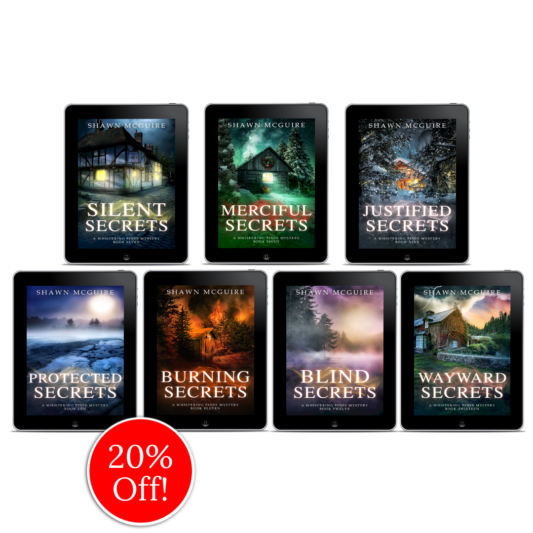 E-book covers on e-readers of Shawn McGuire’s 13-book cozy murder mystery series collection books 7-13.