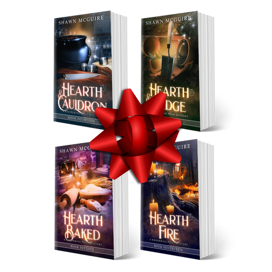 Book covers for books 14-17 of the Whispering Pines Mysteries series by Shawn McGuire on a white background with a red bow.