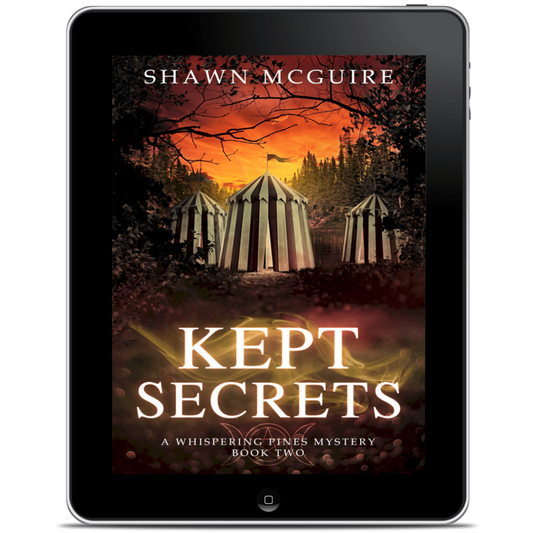 Tablet displaying the book cover of 'Kept Secrets' by Shawn McGuire 
