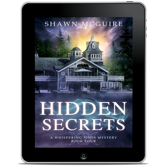 Tablet displaying the book cover of 'Hidden Secrets' by Shawn McGuire