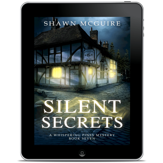 Tablet displaying the ebook cover of 'Silent Secrets' by Shawn McGuire 