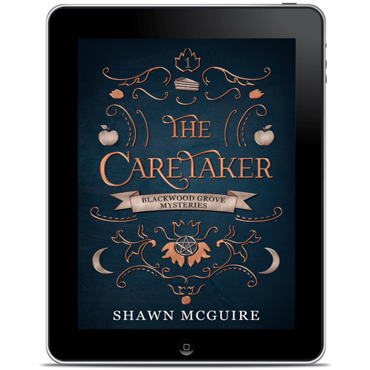 Tablet displaying the book cover of 'The Caretaker' by Shawn McGuire 