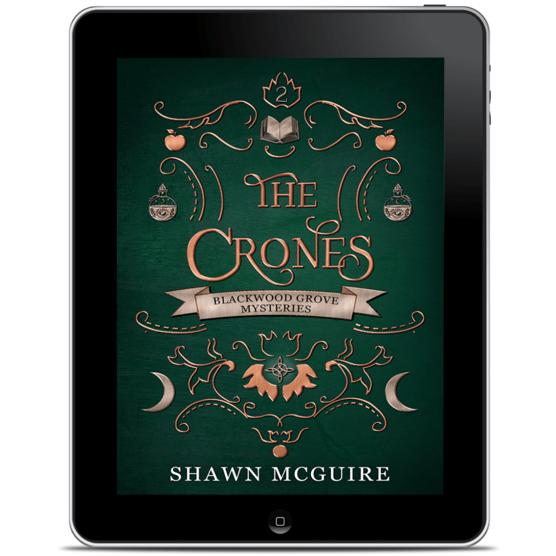 Digital book cover of 'The Crones' by Shawn McGuire displayed on a tablet.