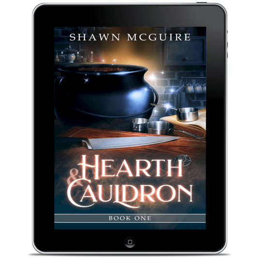 Digital book cover of 'Hearth & Cauldron' by Shawn McGuire displayed on a tablet.