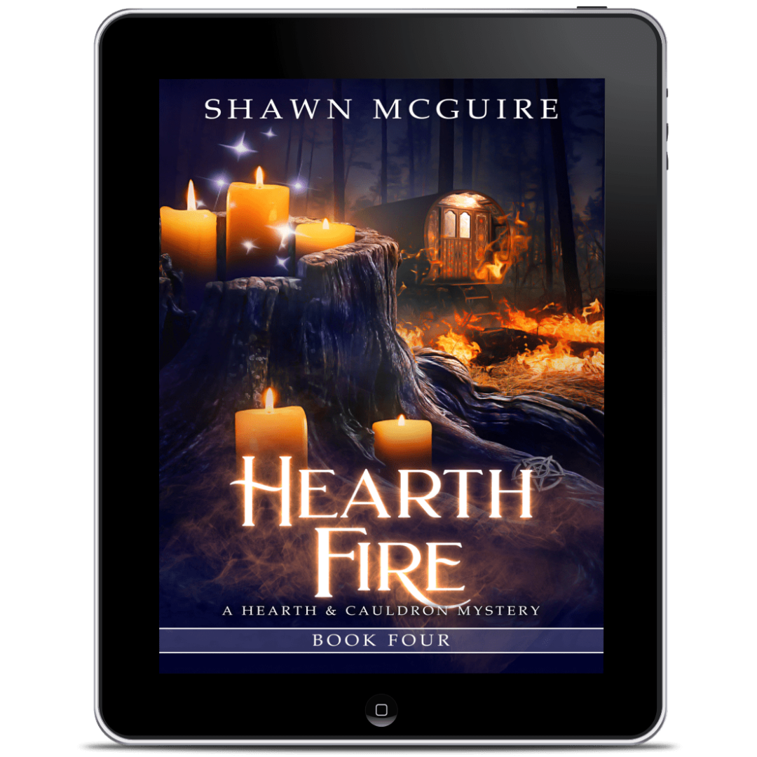 Ebook cover of 'Hearth Fire' by Shawn McGuire on a tablet screen.