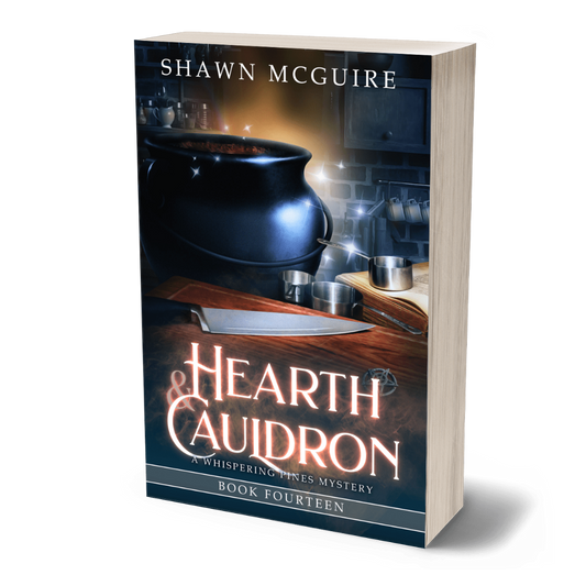 Paperback cover of 'Hearth & Cauldron' by Shawn McGuire