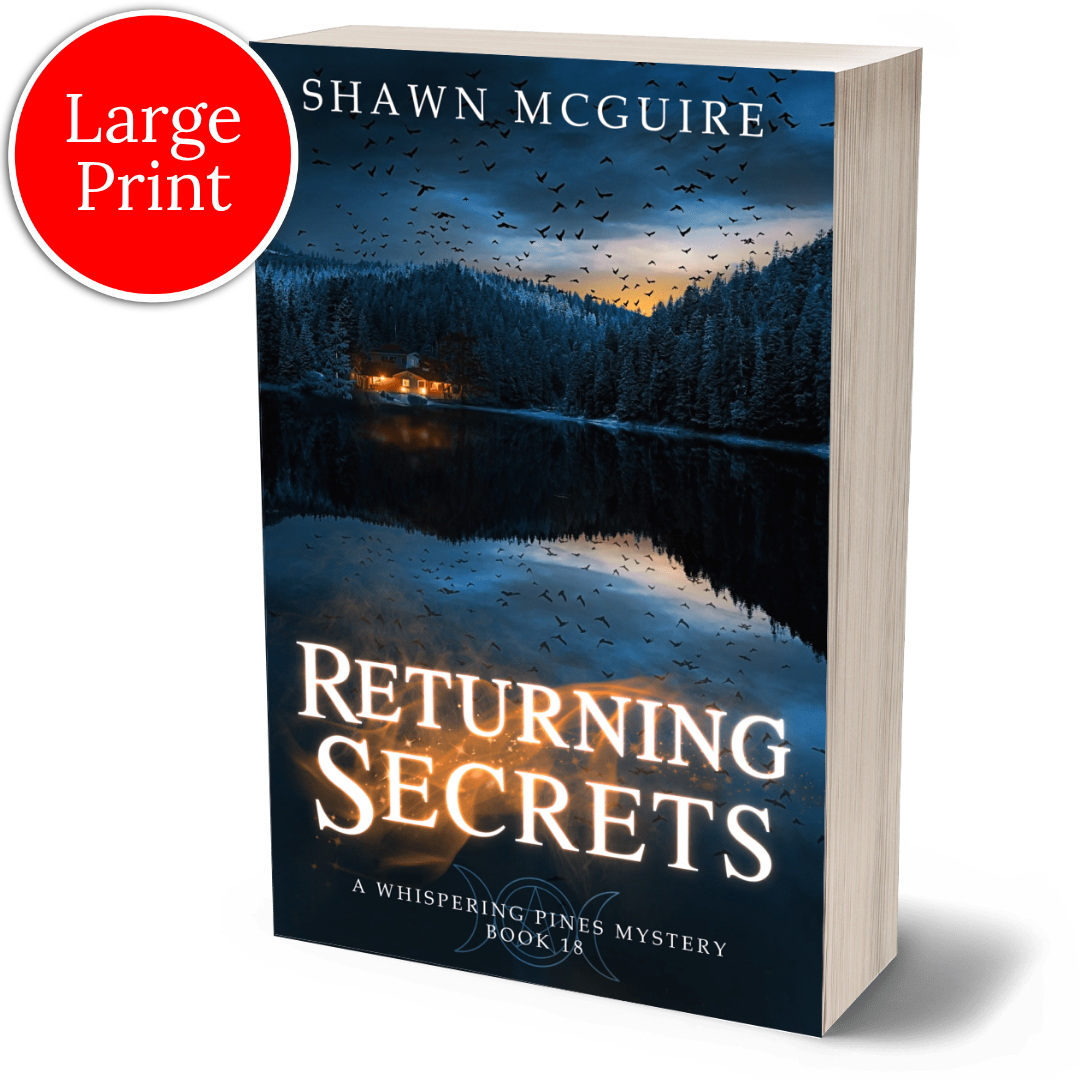 Large print paperback 'Returning Secrets' by Shawn McGuire with a lake, pine forest, and flock of crows on cover.