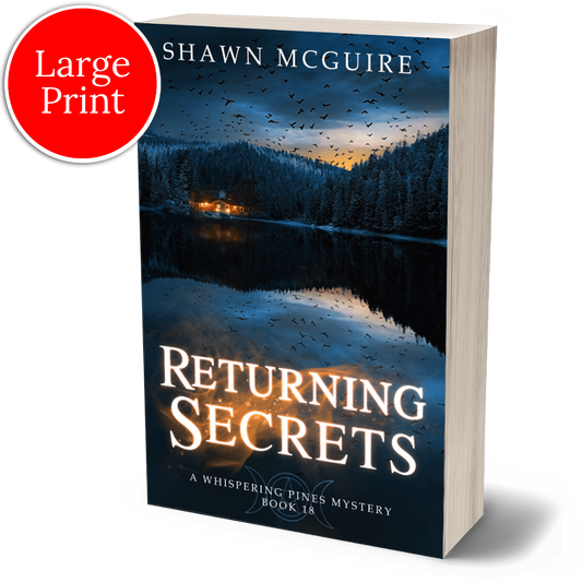 Large print paperback 'Returning Secrets' by Shawn McGuire with a lake, pine forest, and flock of crows on cover.