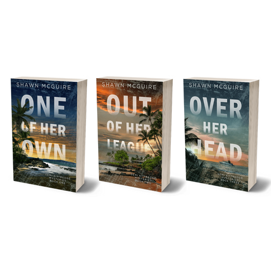 Three paperback books by Shawn McGuire titled 'One of Her Own', 'Out of Her League', and 'Over Her Head.'