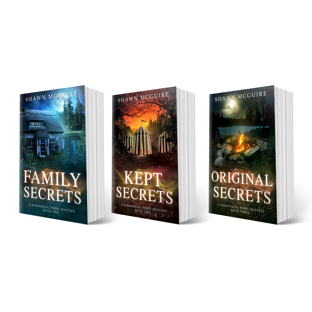 Paperback covers of Shawn McGuire’s 3-book cozy murder mystery series collection books 1-3.