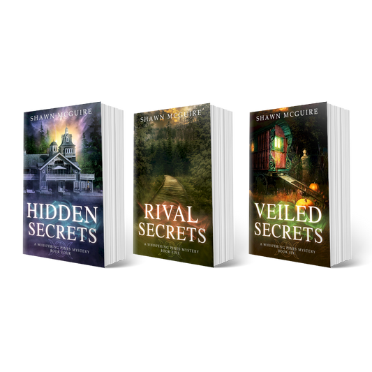Three books titled 'Hidden Secrets', 'Rival Secrets', and 'Veiled Secrets' by Shawn McGuire.