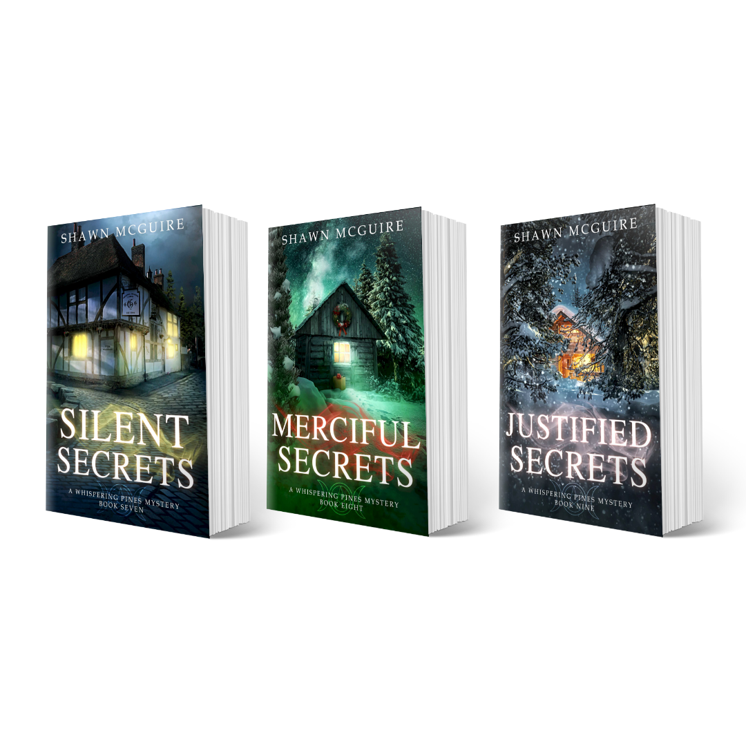 Three book covers of 'Silent Secrets', 'Merciful Secrets', and 'Justified Secrets' by Shawn McGuire.