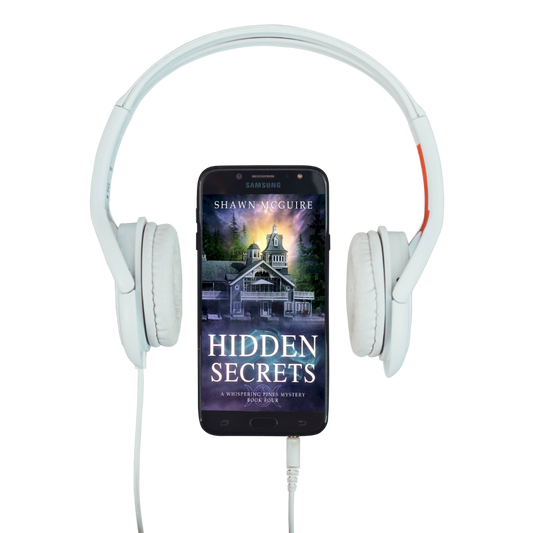 Audiobook cover on cellphone of Shawn McGuire's cozy murder mystery featuring a beautiful house on a lake.