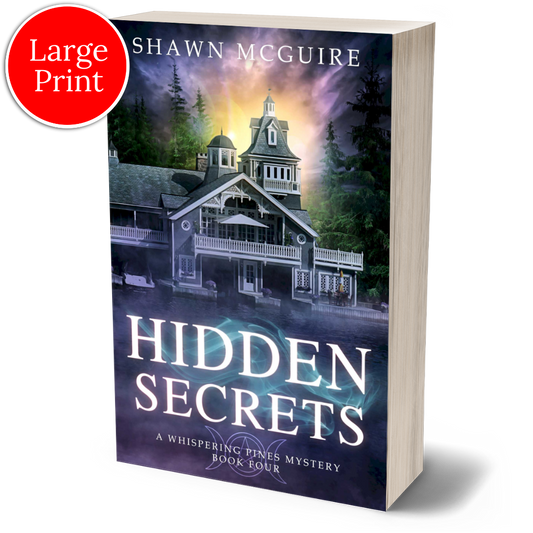 Large print paperback cover of Shawn McGuire's cozy murder mystery featuring a beautiful house on a lake.