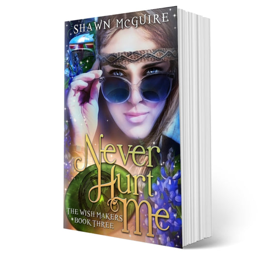 Cover of Shawn McGuire’s young adult fantasy genie wishes series featuring bluebonnets, a hippie bus, and a hippie girl looking over her glasses.