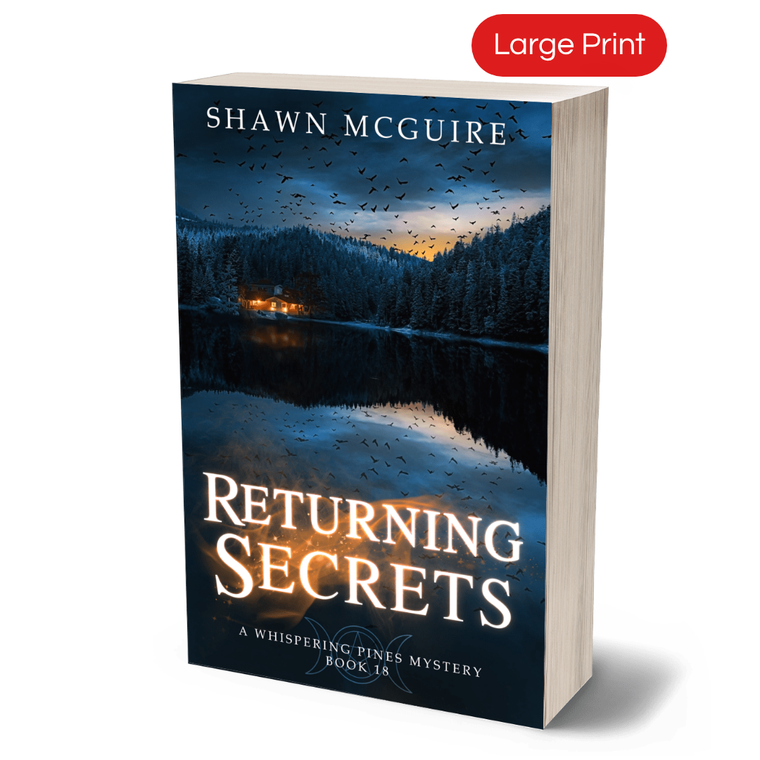 Large print paperback titled 'Returning Secrets' by Shawn McGuire with a lake, pine forest, and flock of crows on cover.