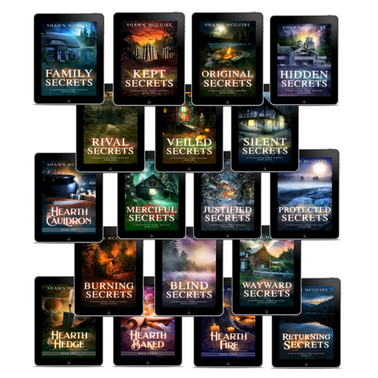 Collection of book covers from the Whispering Pines mysteries series by Shawn McGuire on e-reader devices.