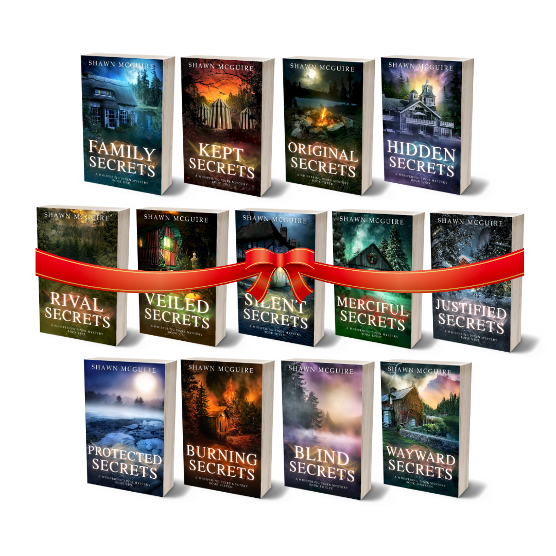 Collection of 'Secrets' book series by Shawn McGuire with colorful covers on a white background with a red gift bow.