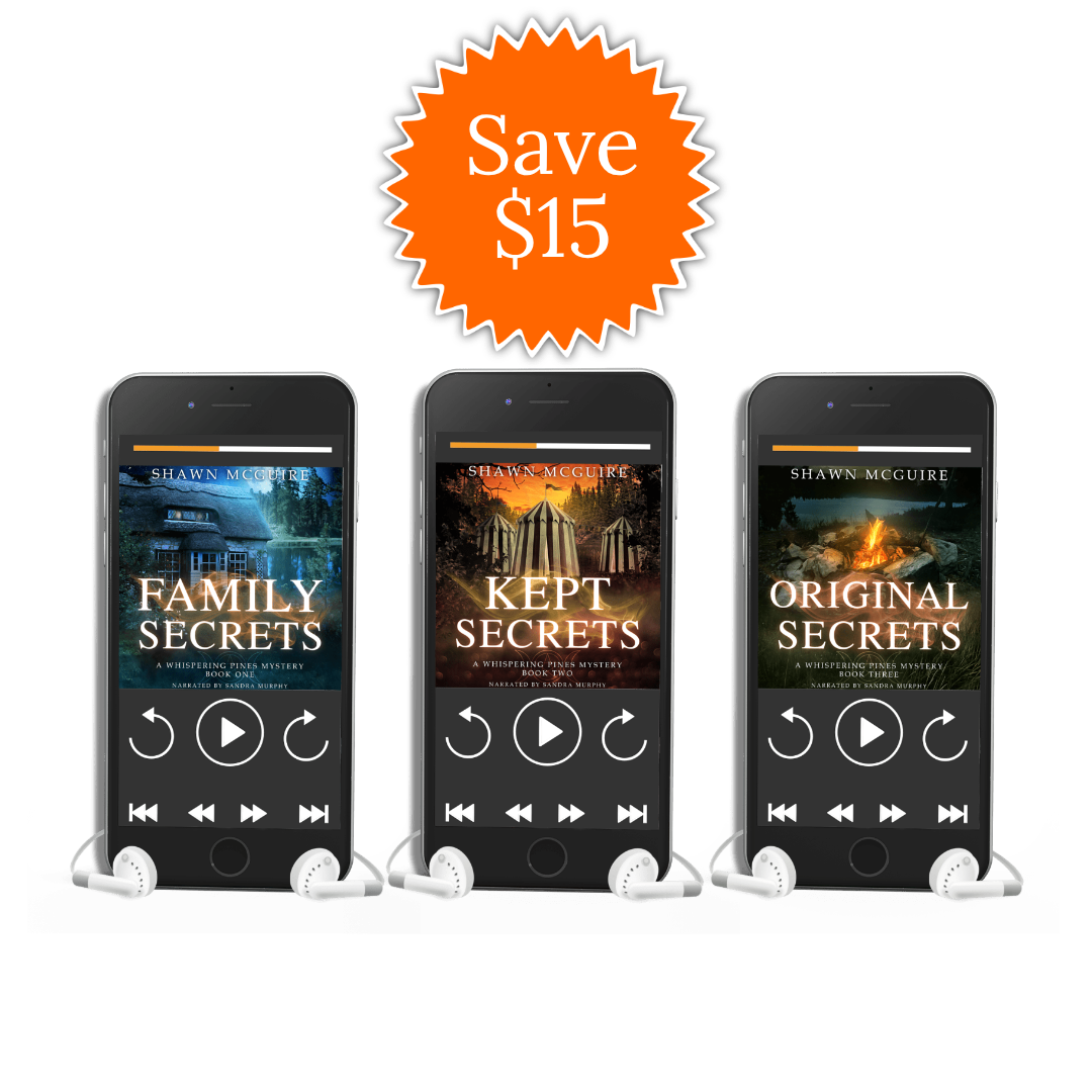 Three cell phones with earbuds featuring the covers for audiobooks Family Secrets, Kept Secrets, and Original Secrets by Shawn McGuire.