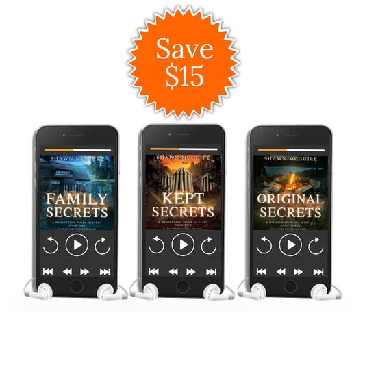 Three cell phones with earbuds featuring the covers for audiobooks Family Secrets, Kept Secrets, and Original Secrets by Shawn McGuire.